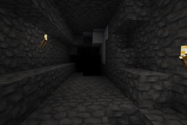 A dark cave with deepslate walls