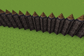 A spiked palisade made of oak logs