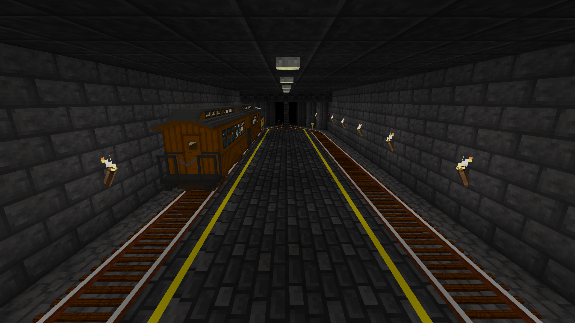 An underground railway station built out of deepslate bricks, blocks, and tiles